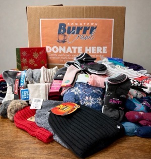 Burr Crawl donations socks hats.